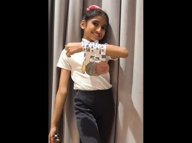 Tisha Chugh Shines with Gold, Silver, and Bronze in Gymnastics Meet